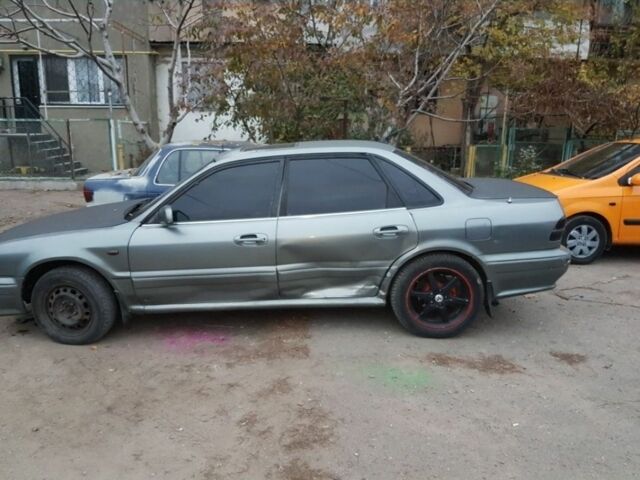 Серый Мицубиси Эклипс, объемом двигателя 3 л и пробегом 400 тыс. км за 50000 $, фото 1 на Automoto.ua