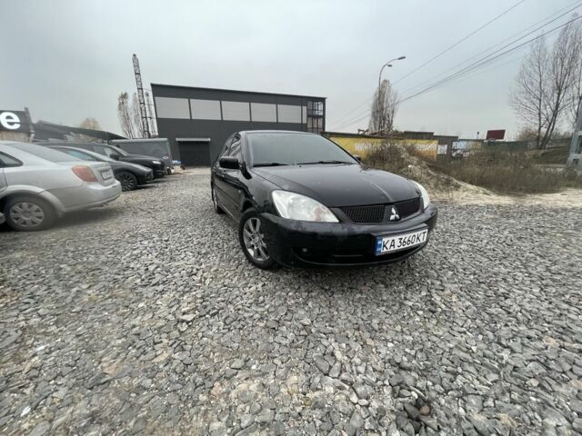 Черный Мицубиси Этерна, объемом двигателя 1.6 л и пробегом 302 тыс. км за 3900 $, фото 1 на Automoto.ua