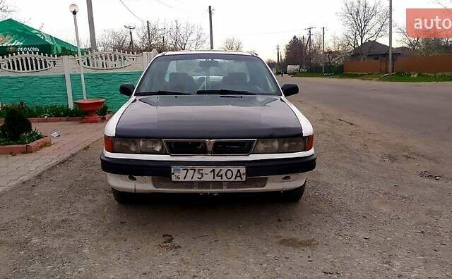 Белый Мицубиси Галант, объемом двигателя 1.8 л и пробегом 485 тыс. км за 1500 $, фото 1 на Automoto.ua