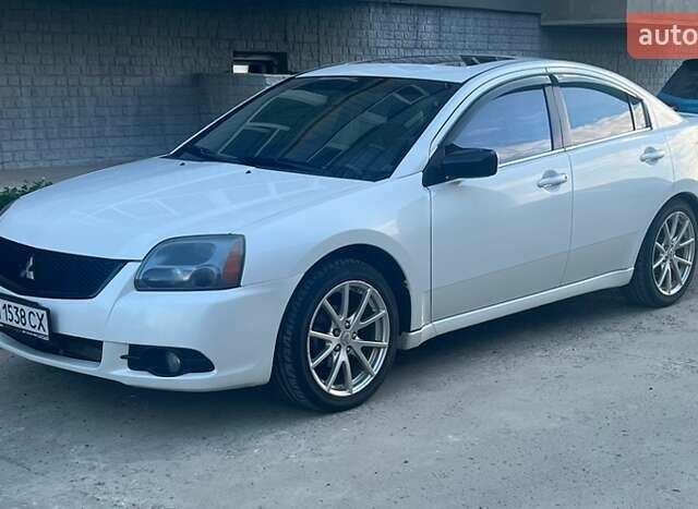 Белый Мицубиси Галант, объемом двигателя 2.38 л и пробегом 130 тыс. км за 9500 $, фото 1 на Automoto.ua