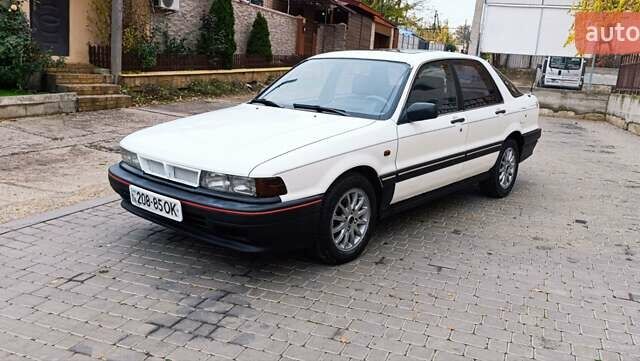 Білий Міцубісі Галант, об'ємом двигуна 2 л та пробігом 400 тис. км за 1500 $, фото 1 на Automoto.ua