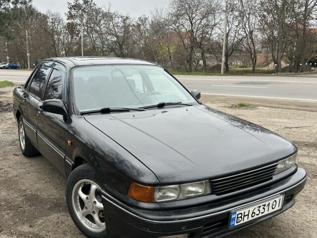 Чорний Міцубісі Галант, об'ємом двигуна 1.8 л та пробігом 354 тис. км за 1400 $, фото 1 на Automoto.ua