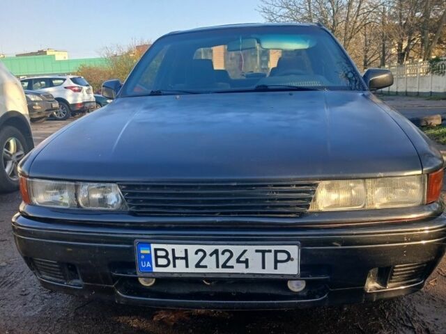 Черный Мицубиси Галант, объемом двигателя 1.8 л и пробегом 279 тыс. км за 1700 $, фото 1 на Automoto.ua