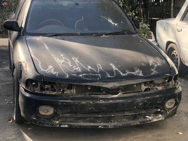 Черный Мицубиси Галант, объемом двигателя 2 л и пробегом 84 тыс. км за 900 $, фото 1 на Automoto.ua