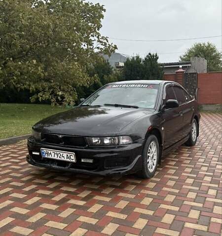 Мицубиси Галант 2001 в Татарбунарах на Automoto.ua Черный Мицубиси Галант, объемом двигателя 2 л и пробегом 200 тыс. км за 2500 $, фото 1 на Automoto.ua
