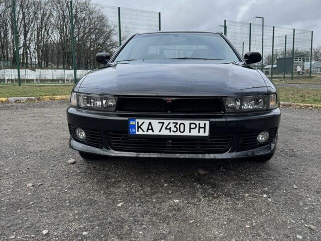 Черный Мицубиси Галант, объемом двигателя 2 л и пробегом 164 тыс. км за 5000 $, фото 1 на Automoto.ua