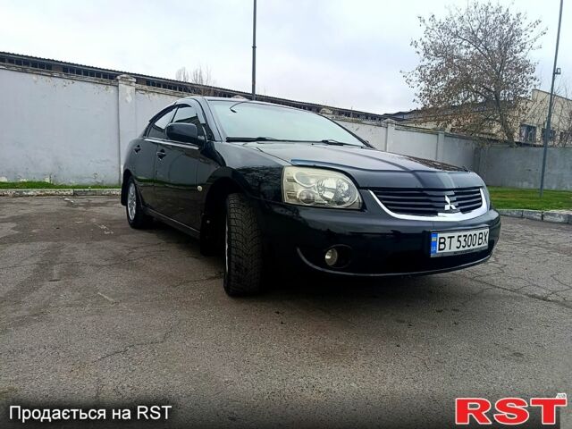 Черный Мицубиси Галант, объемом двигателя 2.4 л и пробегом 142 тыс. км за 6000 $, фото 1 на Automoto.ua