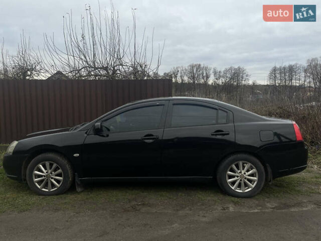 Черный Мицубиси Галант, объемом двигателя 2.4 л и пробегом 320 тыс. км за 4800 $, фото 1 на Automoto.ua