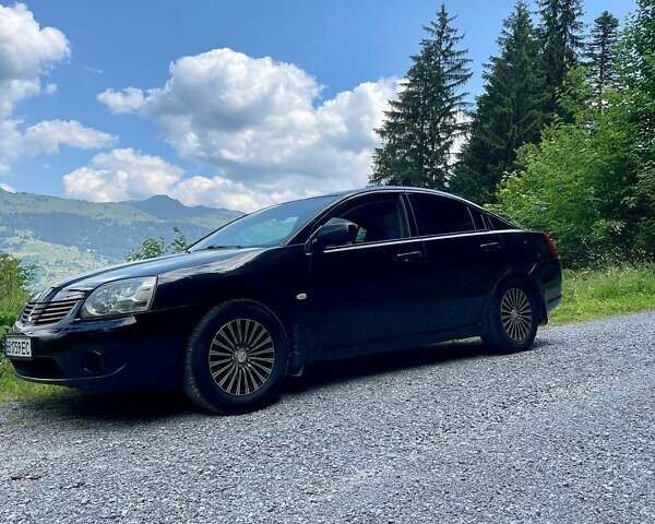 Черный Мицубиси Галант, объемом двигателя 2.38 л и пробегом 220 тыс. км за 6300 $, фото 1 на Automoto.ua