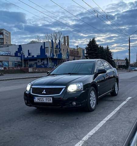 Черный Мицубиси Галант, объемом двигателя 2.38 л и пробегом 163 тыс. км за 6800 $, фото 1 на Automoto.ua