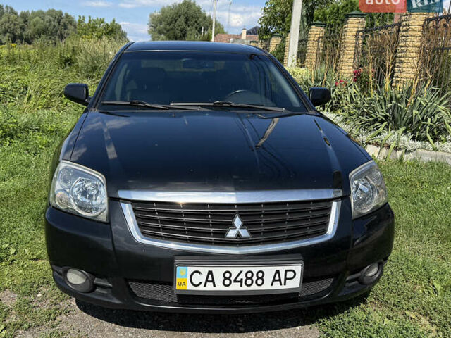 Черный Мицубиси Галант, объемом двигателя 2.4 л и пробегом 275 тыс. км за 5300 $, фото 1 на Automoto.ua