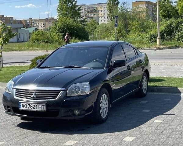 Чорний Міцубісі Галант, об'ємом двигуна 2.4 л та пробігом 310 тис. км за 5600 $, фото 1 на Automoto.ua