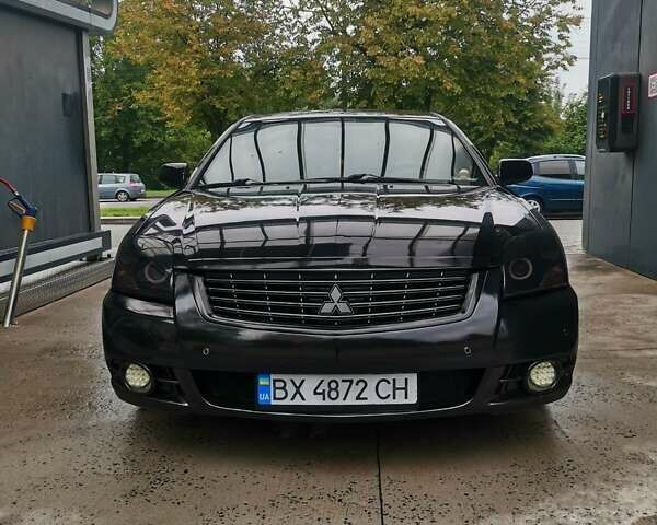 Черный Мицубиси Галант, объемом двигателя 2.38 л и пробегом 193 тыс. км за 7200 $, фото 1 на Automoto.ua