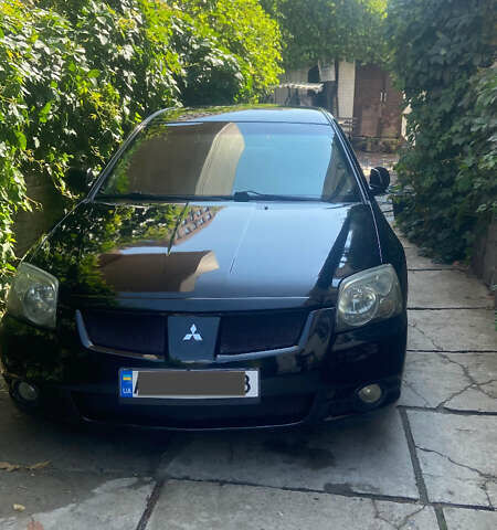 Черный Мицубиси Галант, объемом двигателя 2.38 л и пробегом 408 тыс. км за 5200 $, фото 1 на Automoto.ua