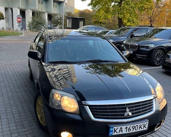 Черный Мицубиси Галант, объемом двигателя 2.4 л и пробегом 262 тыс. км за 6500 $, фото 1 на Automoto.ua