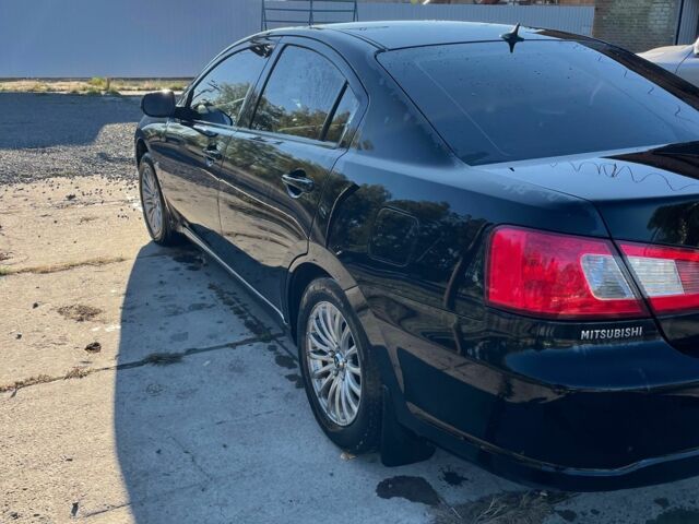 Черный Мицубиси Галант, объемом двигателя 2.4 л и пробегом 265 тыс. км за 5400 $, фото 1 на Automoto.ua