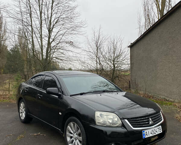 Черный Мицубиси Галант, объемом двигателя 2.4 л и пробегом 341 тыс. км за 5500 $, фото 1 на Automoto.ua