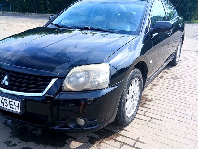 Черный Мицубиси Галант, объемом двигателя 2.5 л и пробегом 303 тыс. км за 4600 $, фото 1 на Automoto.ua