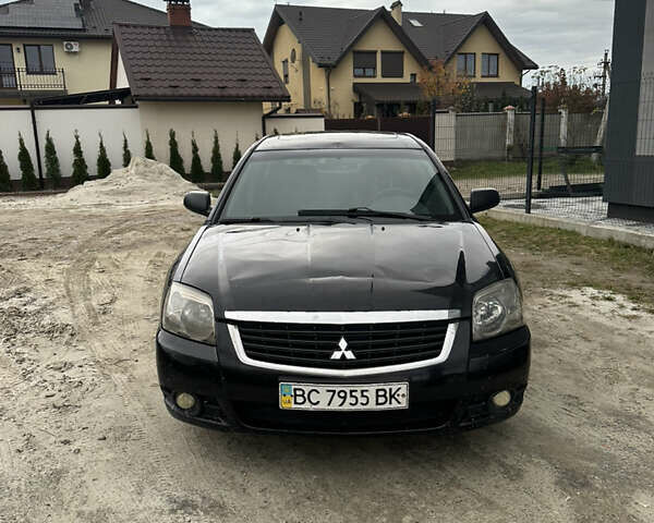 Черный Мицубиси Галант, объемом двигателя 2.38 л и пробегом 560 тыс. км за 3300 $, фото 1 на Automoto.ua