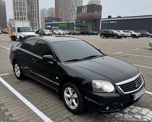 Черный Мицубиси Галант, объемом двигателя 2.38 л и пробегом 191 тыс. км за 6500 $, фото 1 на Automoto.ua