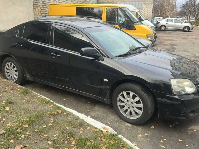 Черный Мицубиси Галант, объемом двигателя 2.4 л и пробегом 450 тыс. км за 4500 $, фото 1 на Automoto.ua