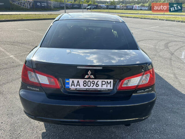 Черный Мицубиси Галант, объемом двигателя 2.4 л и пробегом 462 тыс. км за 5000 $, фото 1 на Automoto.ua