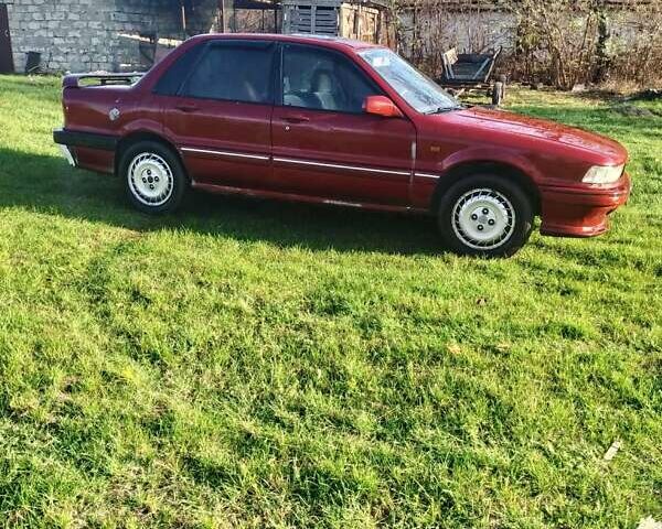 Червоний Міцубісі Галант, об'ємом двигуна 2 л та пробігом 300 тис. км за 850 $, фото 1 на Automoto.ua