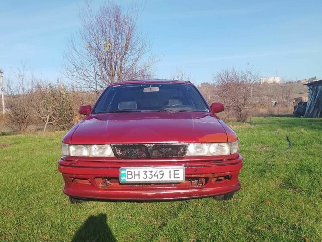 Красный Мицубиси Галант, объемом двигателя 2 л и пробегом 300 тыс. км за 1300 $, фото 1 на Automoto.ua