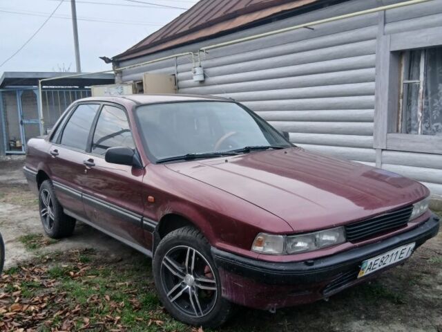 Червоний Міцубісі Галант, об'ємом двигуна 2 л та пробігом 327 тис. км за 1000 $, фото 1 на Automoto.ua