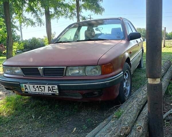 Красный Мицубиси Галант, объемом двигателя 1.8 л и пробегом 400 тыс. км за 999 $, фото 1 на Automoto.ua