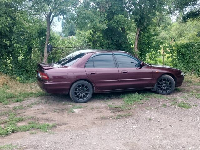 Червоний Міцубісі Галант, об'ємом двигуна 2 л та пробігом 275 тис. км за 2200 $, фото 1 на Automoto.ua