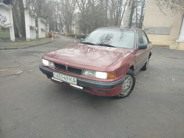 Красный Мицубиси Галант, объемом двигателя 2 л и пробегом 666 тыс. км за 999 $, фото 1 на Automoto.ua