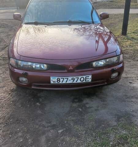 Красный Мицубиси Галант, объемом двигателя 2 л и пробегом 270 тыс. км за 2700 $, фото 1 на Automoto.ua