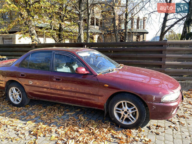 Червоний Міцубісі Галант, об'ємом двигуна 2 л та пробігом 300 тис. км за 1250 $, фото 1 на Automoto.ua