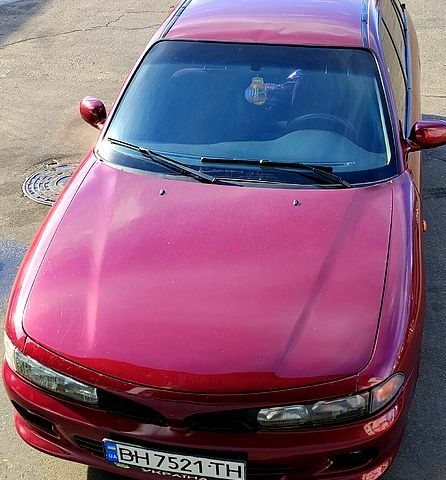 Красный Мицубиси Галант, объемом двигателя 2 л и пробегом 297 тыс. км за 2900 $, фото 1 на Automoto.ua