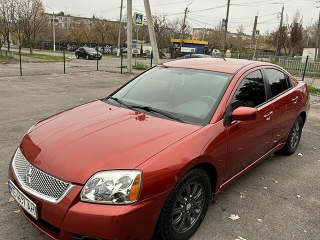 Красный Мицубиси Галант, объемом двигателя 2.4 л и пробегом 230 тыс. км за 7099 $, фото 1 на Automoto.ua