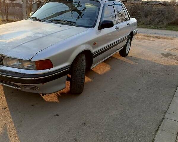 Сірий Міцубісі Галант, об'ємом двигуна 1.8 л та пробігом 364 тис. км за 1500 $, фото 1 на Automoto.ua