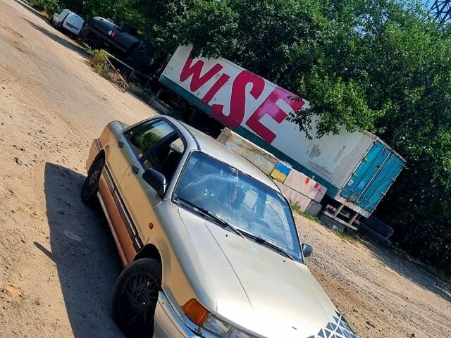 Серый Мицубиси Галант, объемом двигателя 2 л и пробегом 406 тыс. км за 1300 $, фото 1 на Automoto.ua