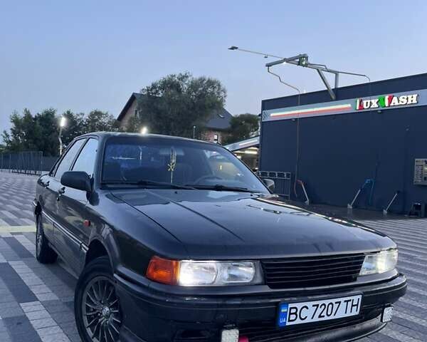 Сірий Міцубісі Галант, об'ємом двигуна 1.76 л та пробігом 380 тис. км за 1000 $, фото 1 на Automoto.ua