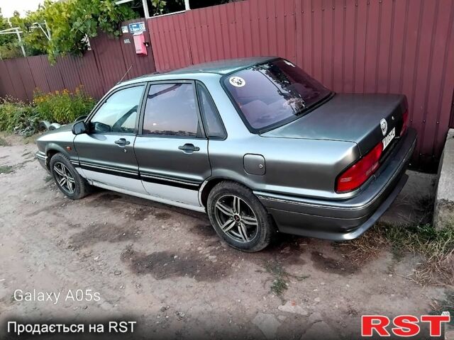 Мицубиси Галант 1992 в Подольск (Котовск) на Automoto.ua Серый Мицубиси Галант, объемом двигателя 1.8 л и пробегом 0 тыс. км за 1740 $, фото 1 на Automoto.ua