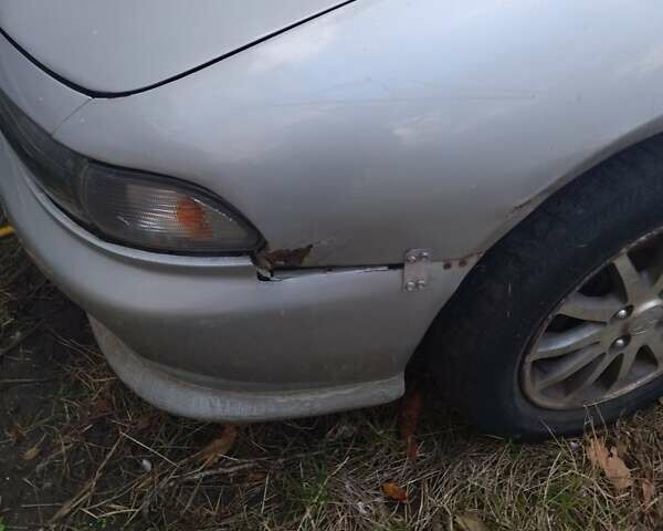 Серый Мицубиси Галант, объемом двигателя 2 л и пробегом 318 тыс. км за 1500 $, фото 1 на Automoto.ua