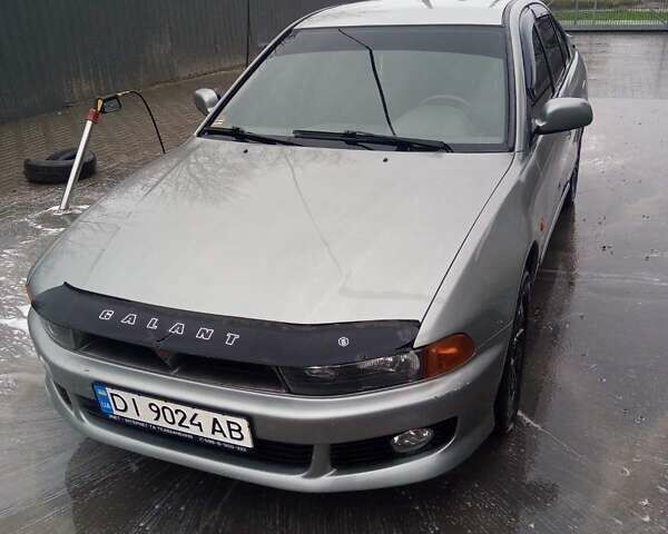 Серый Мицубиси Галант, объемом двигателя 2.5 л и пробегом 313 тыс. км за 3500 $, фото 1 на Automoto.ua