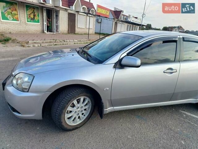 Серый Мицубиси Галант, объемом двигателя 2.4 л и пробегом 297 тыс. км за 6000 $, фото 1 на Automoto.ua