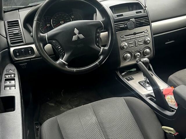 Серый Мицубиси Галант, объемом двигателя 2.4 л и пробегом 245 тыс. км за 5500 $, фото 1 на Automoto.ua