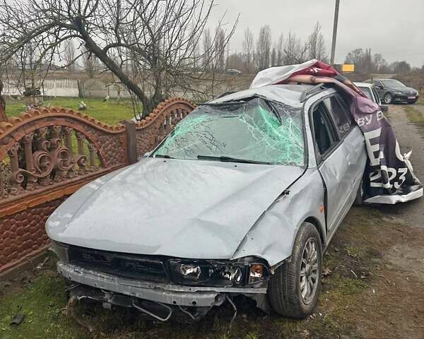 Сірий Міцубісі Галант, об'ємом двигуна 2.5 л та пробігом 400 тис. км за 1000 $, фото 1 на Automoto.ua
