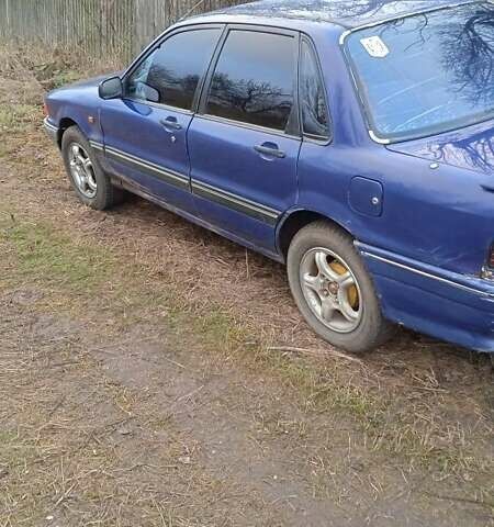 Синий Мицубиси Галант, объемом двигателя 1.8 л и пробегом 500 тыс. км за 1000 $, фото 1 на Automoto.ua