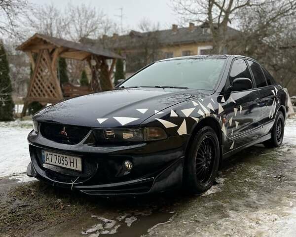 Синий Мицубиси Галант, объемом двигателя 2.4 л и пробегом 300 тыс. км за 2000 $, фото 1 на Automoto.ua