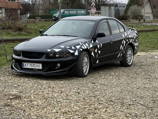 Синий Мицубиси Галант, объемом двигателя 2.4 л и пробегом 300 тыс. км за 2000 $, фото 1 на Automoto.ua