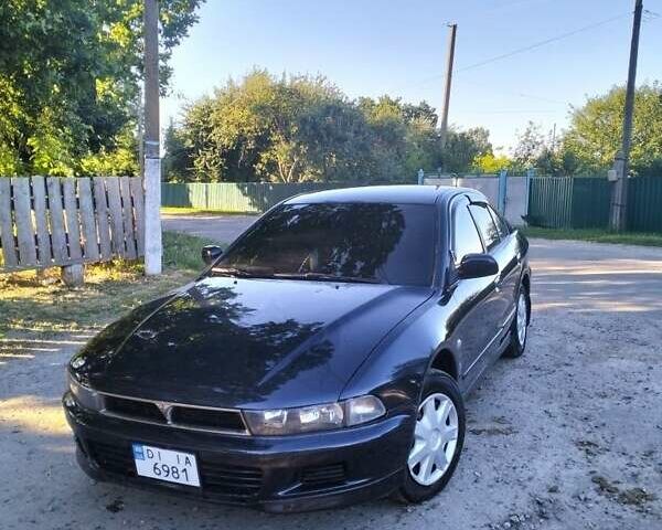 Синий Мицубиси Галант, объемом двигателя 2 л и пробегом 300 тыс. км за 4000 $, фото 1 на Automoto.ua