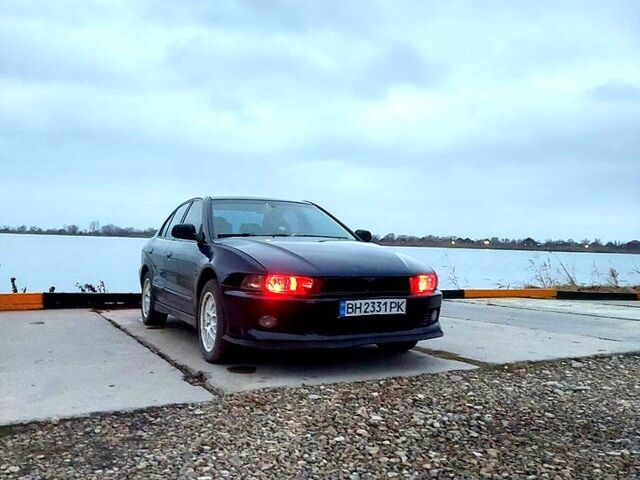 Синий Мицубиси Галант, объемом двигателя 2 л и пробегом 295 тыс. км за 2700 $, фото 1 на Automoto.ua